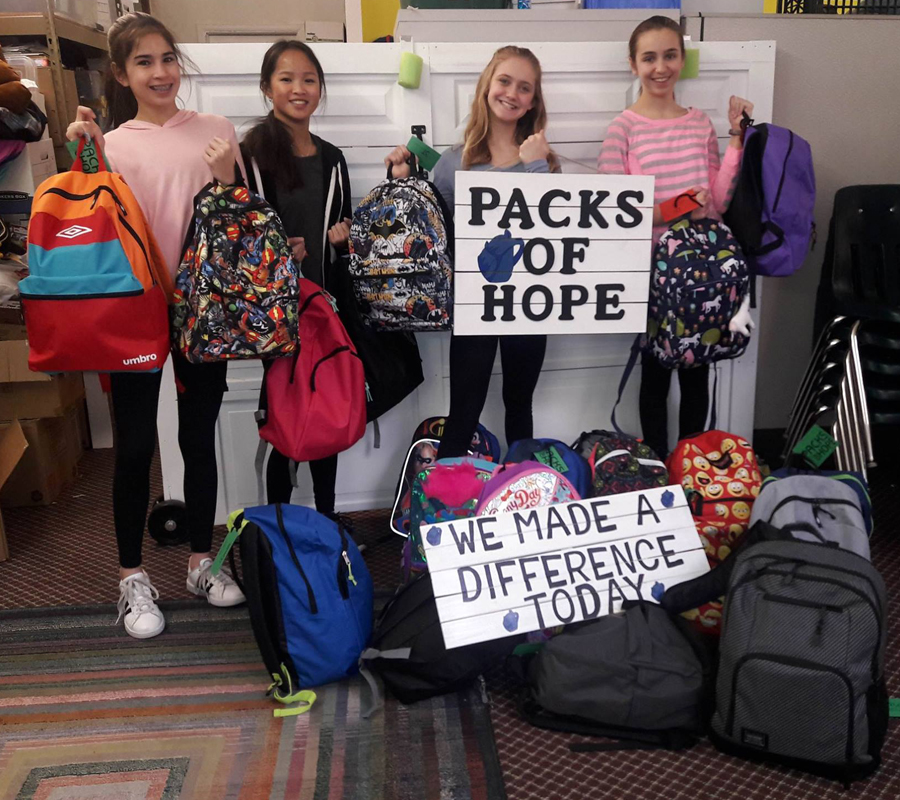 Packs of Hope Girl Scouts Volunteers